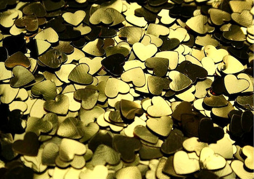 gold hearts in a pile